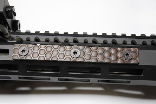 Handcrafted leather rail grip for MLOK rifle rails, featuring a textured surface with 1mm of g10 material on back for heat resistance, cool, new, best handguard.