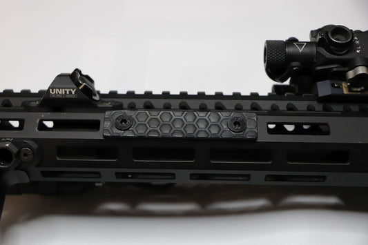 Handcrafted leather rail grip for MLOK rifle rails, featuring a textured surface with 1mm of g10 material on back for heat resistance, cool, new, best handguard.