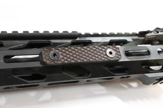 Handcrafted leather rail grip for MLOK rifle rails, featuring a textured surface with 1mm of g10 material on back for heat resistance, cool, new, best